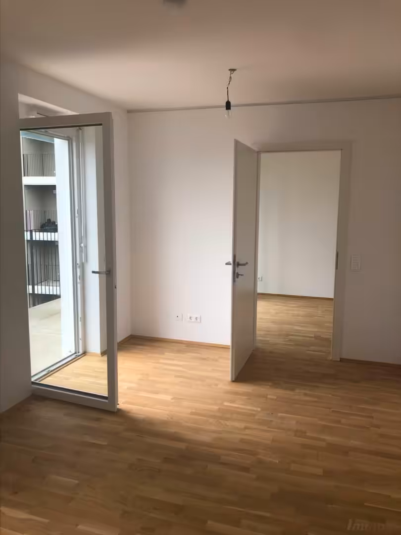Wohnzimmer mit Blick zum Schlafzimmer
